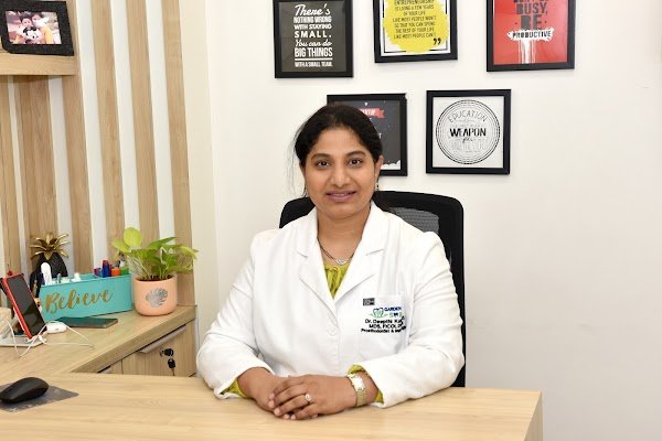 Dr. Deepthi Kalahasti in her consultation room at GardenCity Smiles™