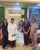GardenCity Smiles team photographed together in the clinic reception.